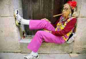 old lady smoking cigar